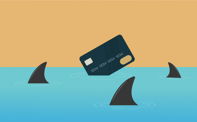 Credit Card falling into water with shark fins