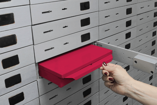 Red box within unlocked safety deposit box