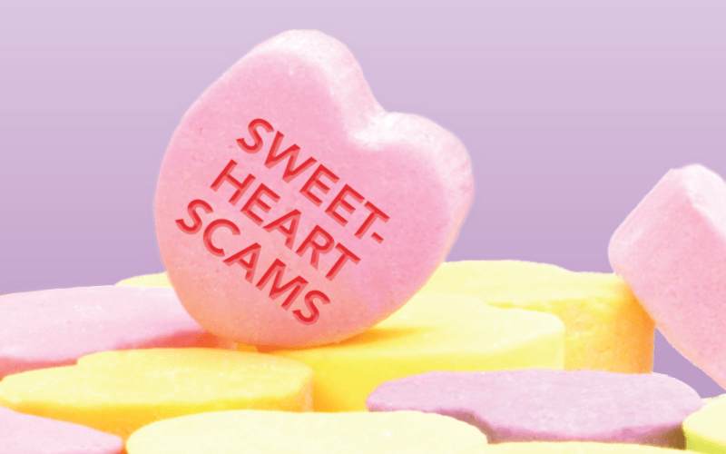 Heart-shaped candy with words Sweetheart Scams printed