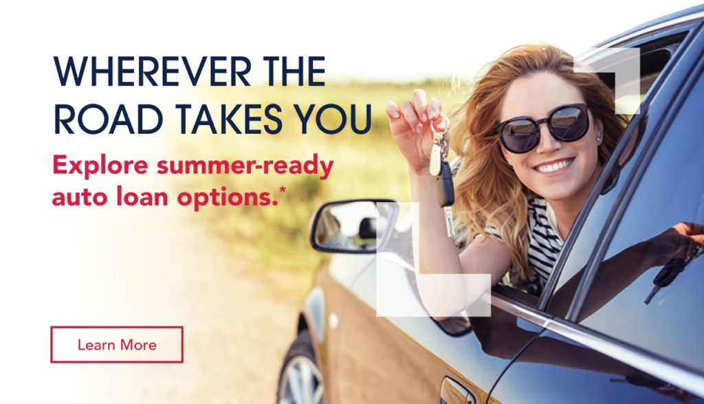 Woman in new car holding keys on a summer day